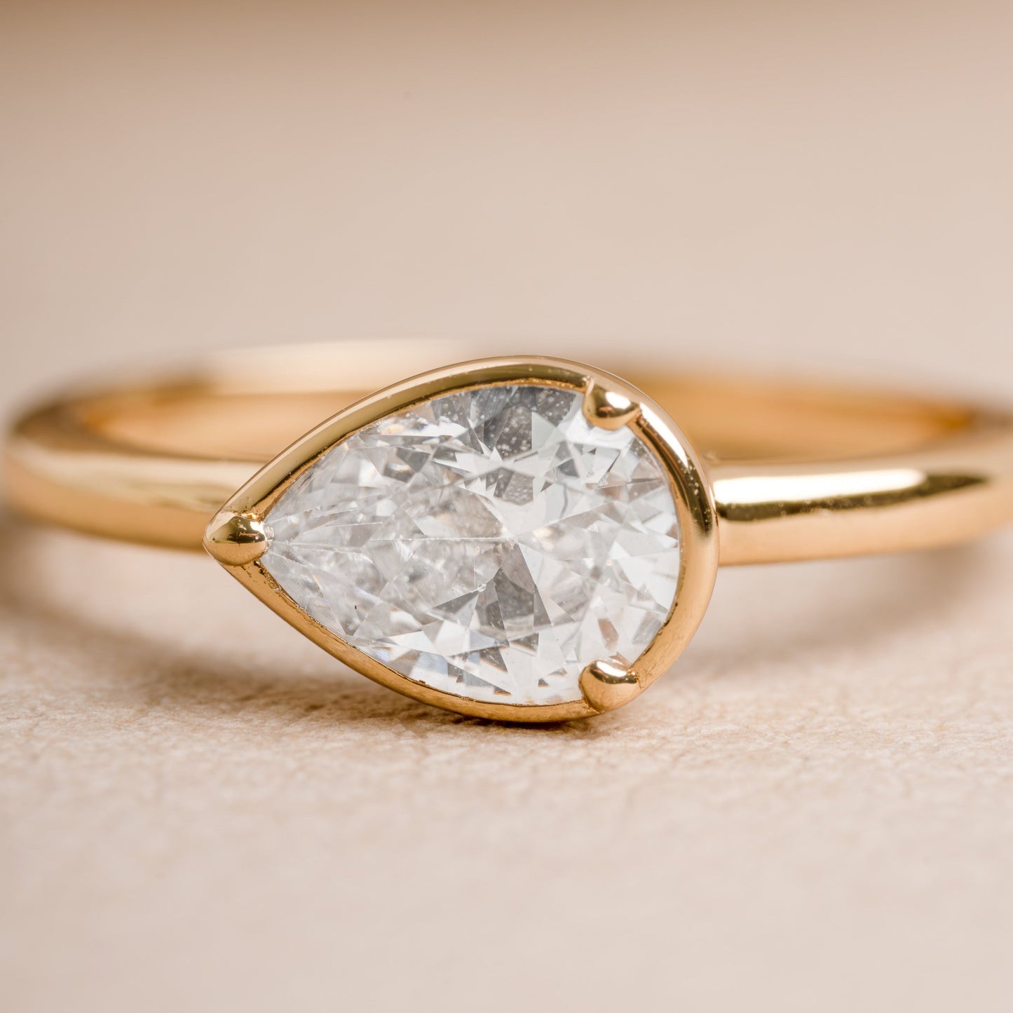 Modern Sideways Pear Bezel CZ Ring