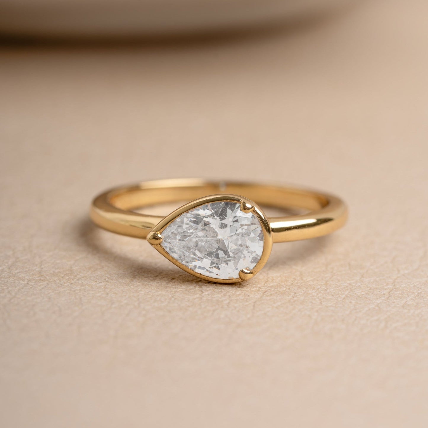 Modern Sideways Pear Bezel CZ Ring
