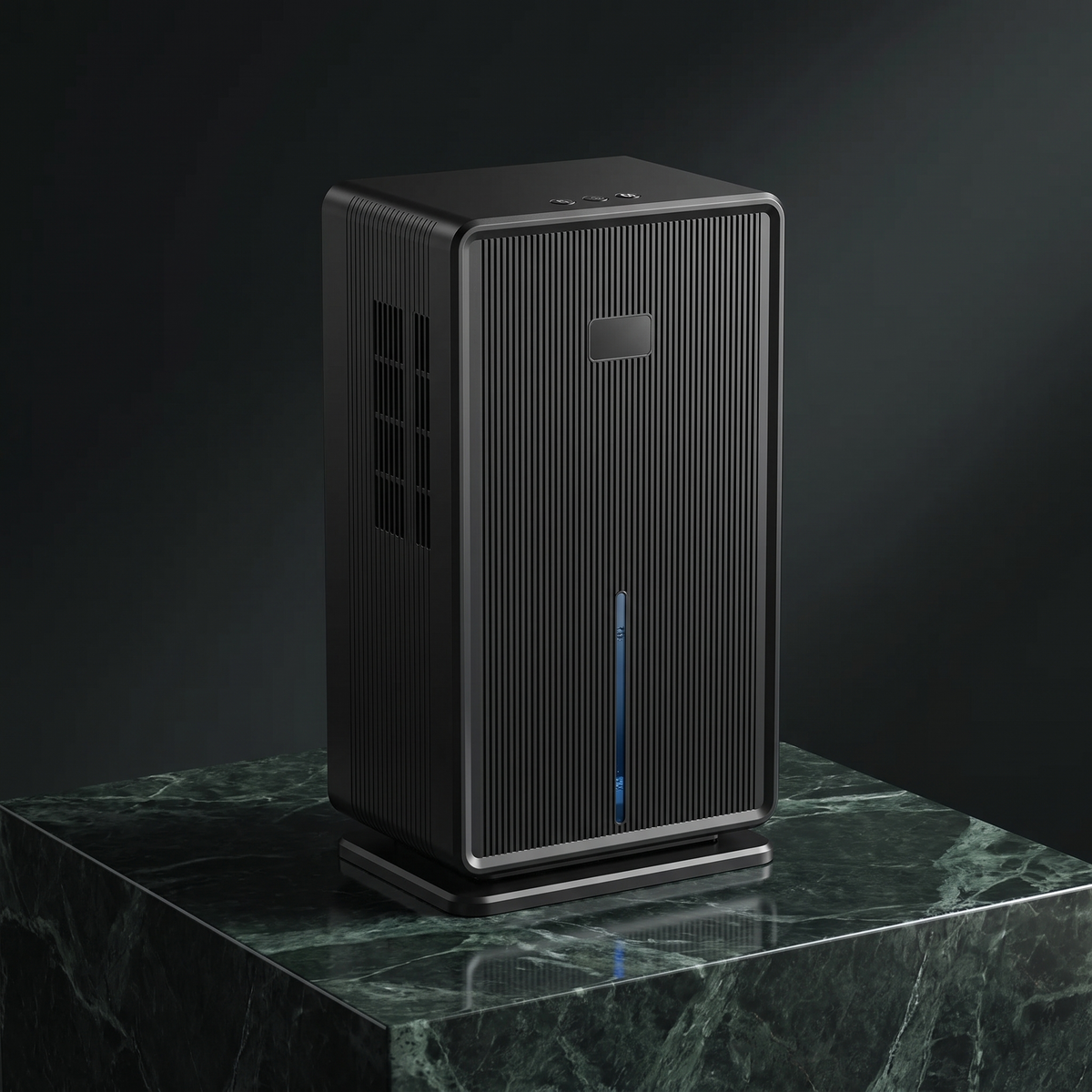 Ribbed compact dehumidifier in black on a green marble plinth